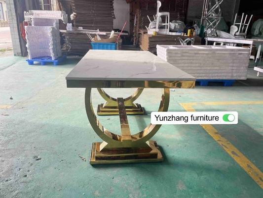 सिल्वर गोल्ड स्टेनलेस स्टील लेग डाइनिंग टेबल मार्बल टॉप के साथ 6 सीटर सेट करें