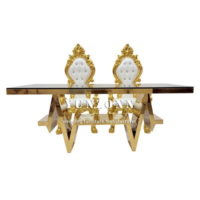 अच्छा दाम थोक व्यापारी खरपतवार काटने का फर्नीचर तालिका आधुनिक लक्जरी सोना स्टेनलेस स्टील कांच भोजन तालिका 6 कुर्सियों सेट ऑनलाइन