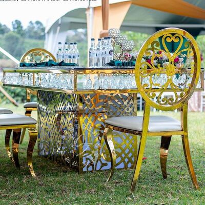 अच्छा दाम लक्जरी होटल स्टेनलेस स्टील क्रिस्टल पेंडेंट गोल्डन ग्लास वेडिंग और इवेंट डाइनिंग टेबल बैंक्वेट रेस्तरां और पार्टियों के लिए ऑनलाइन