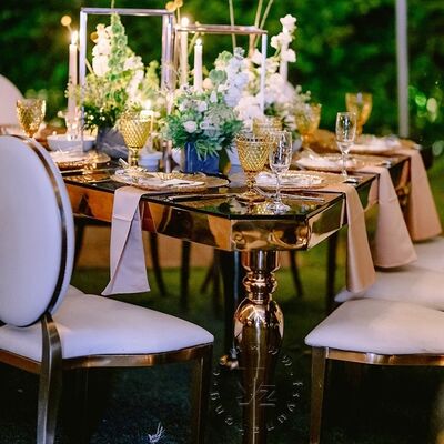 अच्छा दाम YZ आधुनिक त्रिभुज भोजन टेबल सेट स्टेनलेस स्टील बेस टेम्पर्ड ग्लास टॉप मल्टी कलर फ्रेम टिकाऊ आउटडोर अपार्टमेंट विला ऑनलाइन