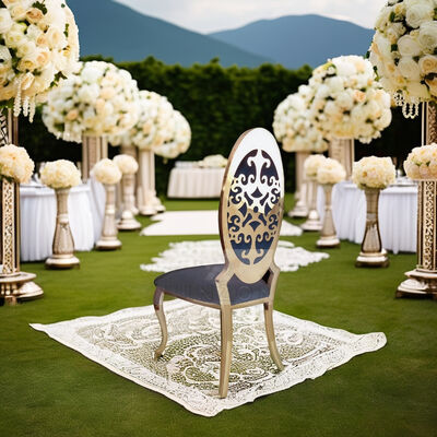 अच्छा दाम लक्जरी क्लासिक हाई बैक डाइनिंग चेयर गोल्ड स्टेनलेस स्टील फ्रेम नक्काशीदार फूल बैक शादियों अपार्टमेंट होटल इवेंट्स के लिए ऑनलाइन