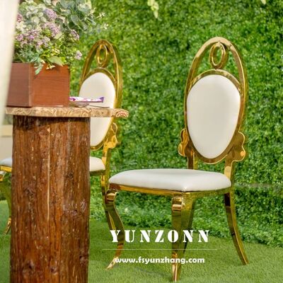 अच्छा दाम आधुनिक सोने के अंडाकार पीठ वाली शादी की डाइनिंग चेयर थोक स्टेनलेस स्टील फर्नीचर बैंक्वेट और होटलों के लिए ऑनलाइन
